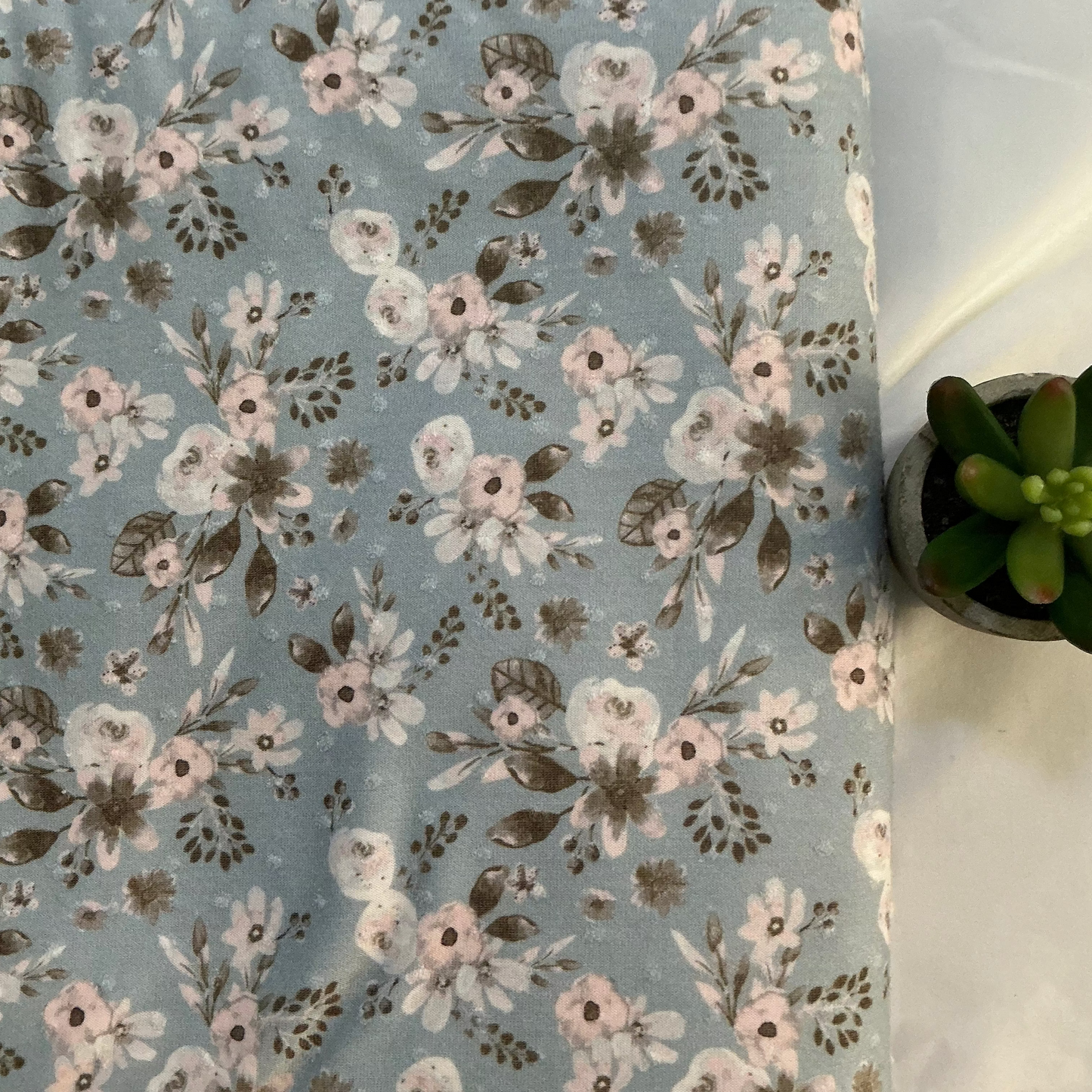 Light Blue with Soft Pink Flowers