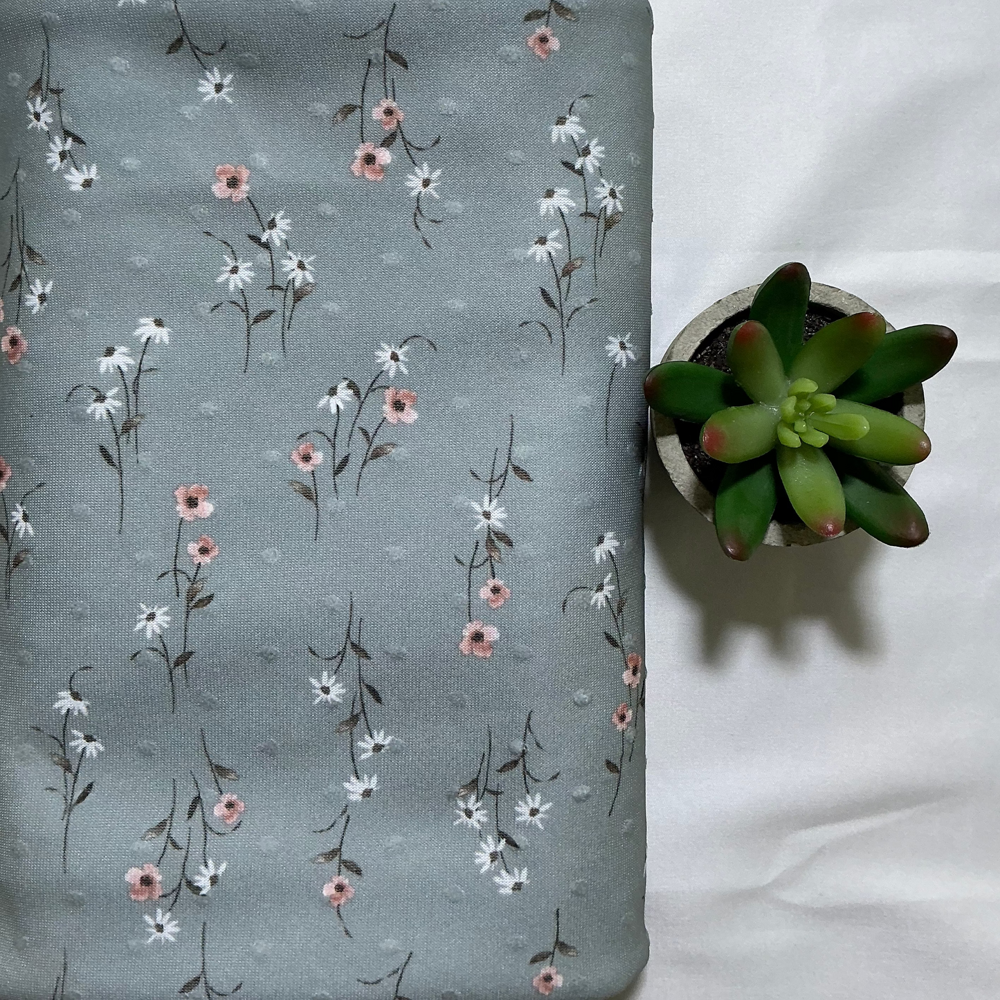 Mini Flowers on Swiss Dot. Priced by 1\2 yard