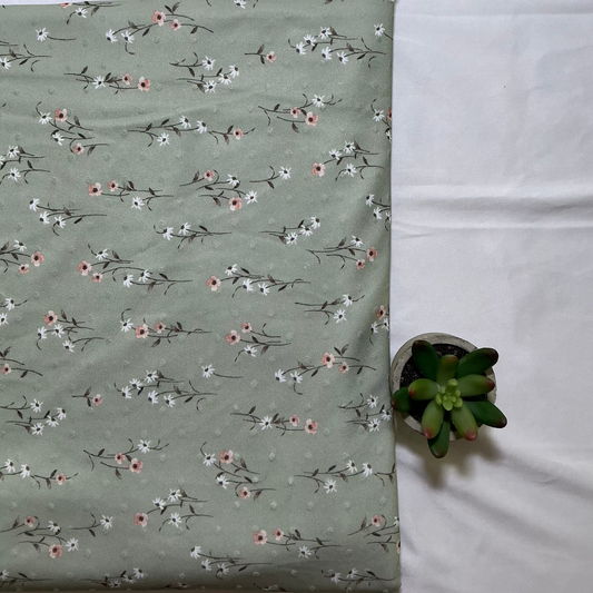 Mini Flowers on Swiss Dot. Priced by 1\2 yard